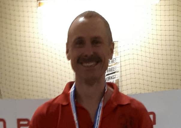 All smiles from teacher John Anderson after his bronze medal at the British Modern Biathlon Championships.