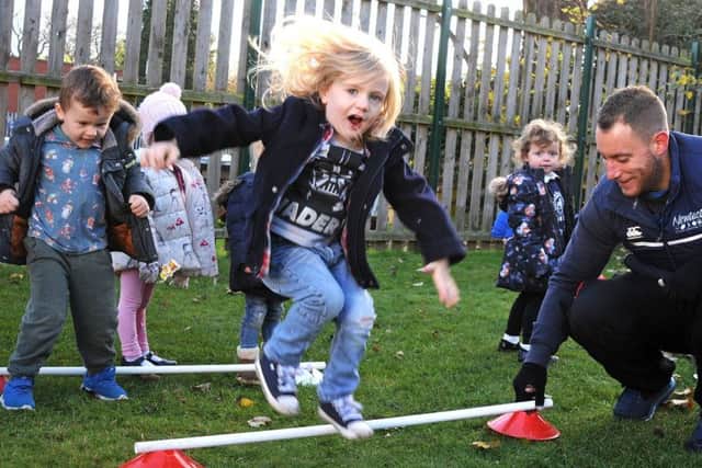 Sports coach, Ben Ennals, from New Tactics Sports Coaching, puts pupils from the Gainsborough Nursery School through their paces thanks to a grant from the Thonock Trust.