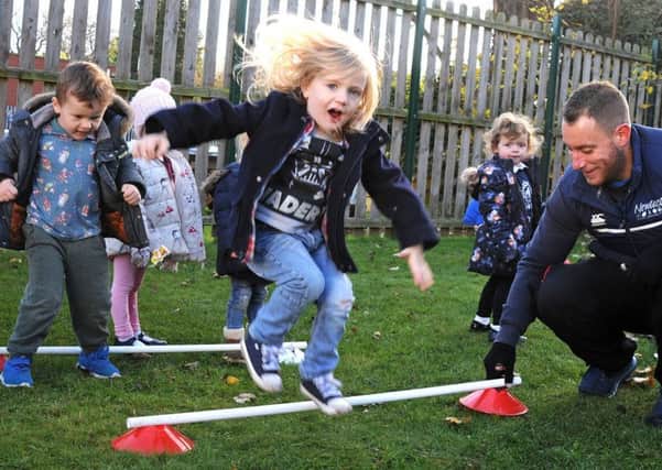 Sports coach, Ben Ennals, from New Tactics Sports Coaching, puts pupils from the Gainsborough Nursery School through their paces thanks to a grant from the Thonock Trust.