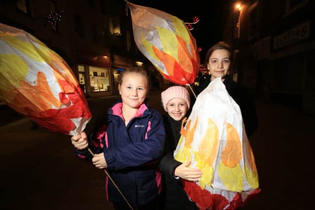 Gainsborough Illuminate Lantern Parade 2017. Pictured are Jessica Ward, eight, Lucy Fall, eight, and Georgia Watkin, ten. Picture: Chris Etchells