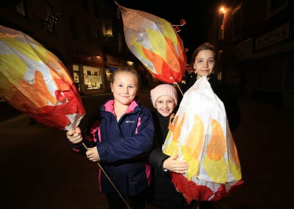 Gainsborough Illuminate Lantern Parade 2017. Pictured are Jessica Ward, eight, Lucy Fall, eight, and Georgia Watkin, ten. Picture: Chris Etchells