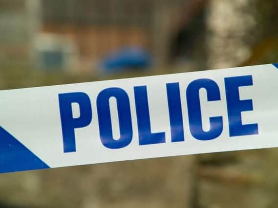 A woman has been arrested on suspicion of neglecting a child after a toddler spent the evening being looked after in a police station.