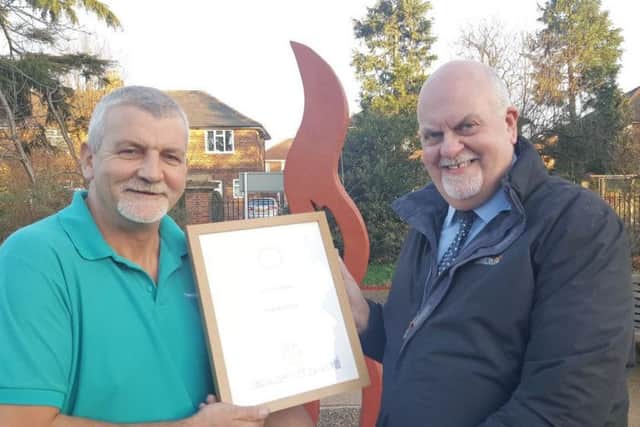 Gainsborough in Bloom secretary, Vaughan Hughes, presents Colin Stubley a Judges Special Award for his enthusiastic gardening maintenance and colourful planted boxes at the John Coupland Hospital.