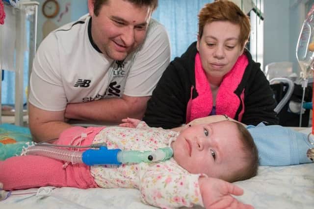 Eight-month-old Hoppe Clarke with mum Tina and dad Lee. Photo contributed.