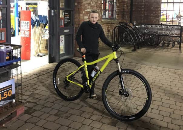 Thomas Bannister with his new bike