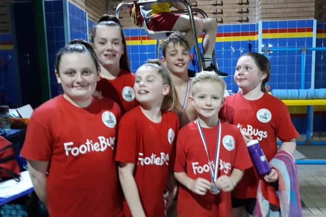 Swimmers from Parish School, who won the girls trophy for large schools.
