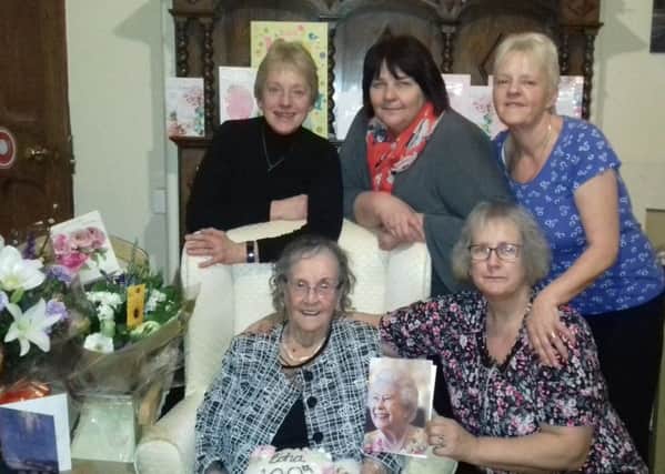 Edna Ratcliffe pictured with staff at Redcote Residential Home. Photo contributed.