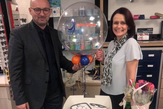 Husband-and-wife team Roy and Anna Walters, whose opticians business has been open for 20 years.