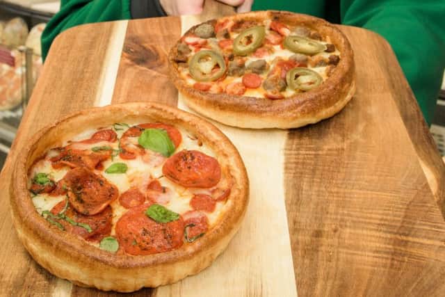 EDITORIAL USE ONLYA Yorkshire Pudding Pizza has been created by Morrisons ahead of Yorkshire Pudding Day on Saturday February 3rd. PRESS ASSOCIATION. Photo. Issue date: Friday February 2, 2018. The cheese and batter hybrid combines a crispy Yorkshire pudding base made in Doncaster in South Yorkshire with a filling of tomato sauce and mozzarella. It will be available in two flavours, 'Pepperoni' and 'Meat Feast' with mini meatballs, pepperoni, spicy beef and jalapeo chillies. The Yorkshire Pudding Pizza is available now in all 491 Morrisons stores for Â£3. Photo credit should read: Anthony Upton/PA Wire