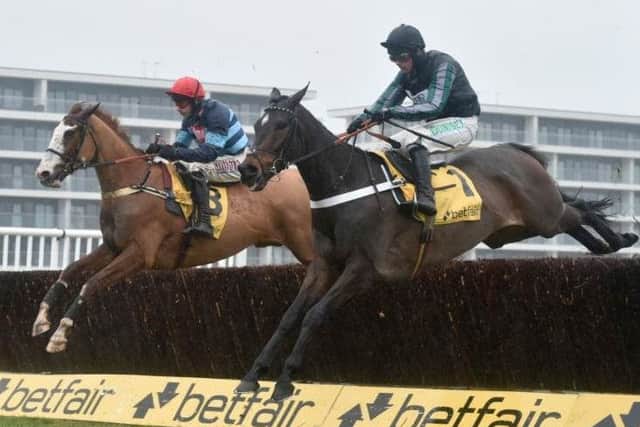 Altior (right) on his way to victory, and a classy comeback, in the Betfair Exchange Game Spirit Chase at Newbury on Saturday.