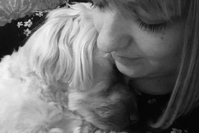 Safe At Last: Herbie the 'Morky' (a Maltese/Yorkshire Terrier cross) is reunited with owner Kathy Holmes.