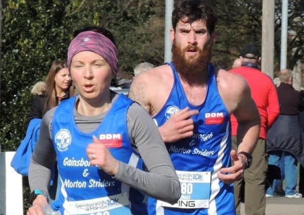 Laura Pearson and Tom Bond, who took part in their first 10K races in Striders colours (PHOTO BY: Shane Hill).