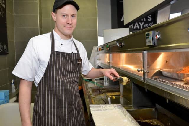 Gavin Cowan preparing some of the battered Creme Eggs.
