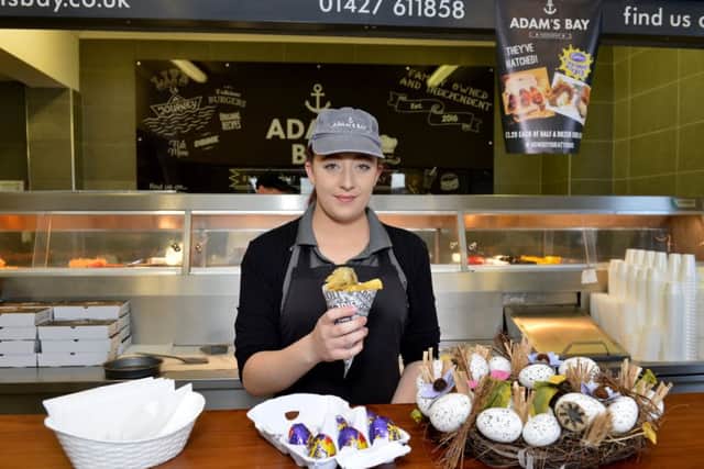 Adam's Bay fish and chip shop launch battered Cadbury Creme Egg, pictured is Kate Bowser.
