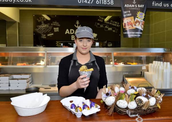 Adam's Bay fish and chip shop launch battered Cadbury Creme Egg, pictured is Kate Bowser.