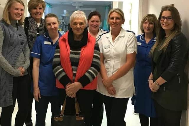 The family of Michael Hargreaves pictured with Bassetlaw Hospital ICU staff.