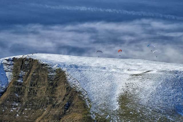 Michael Hardy captured this phenomenal shot of a snow-capped Mam Tor complete with paragliders.