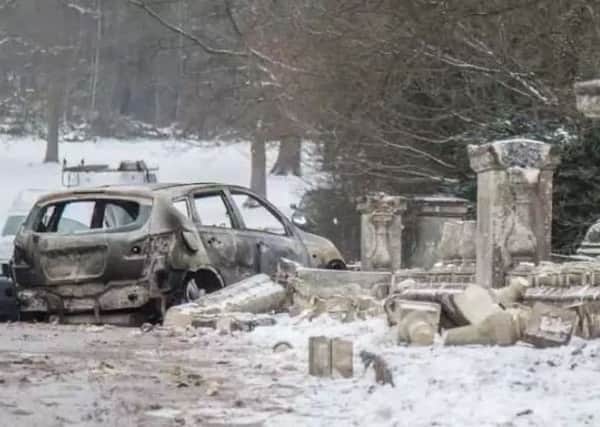 Clumber Park's ornate bridge was smashed into with a car which was then set on fire and dumped at the scene.