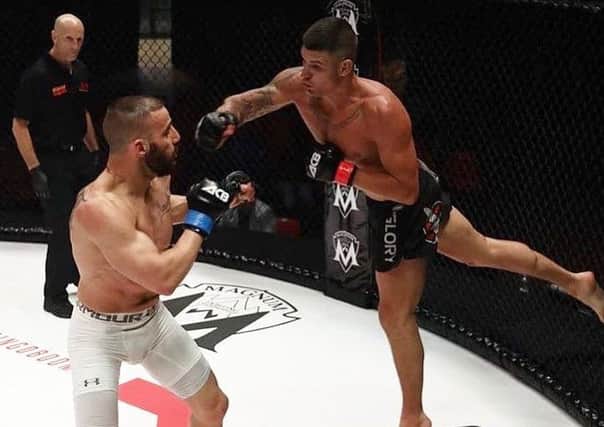A spectacular punch by Ricardo Franco (right) during his latest mixed martial arts fight in Italy.