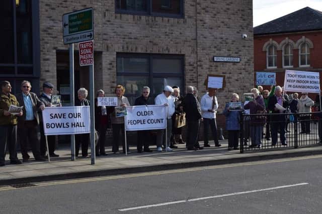 Campaigners protesting against the decision to close their indoor bowls hall.