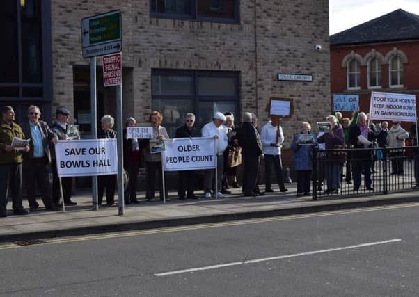 Campaigners protesting against the decision to close their indoor bowls hall.