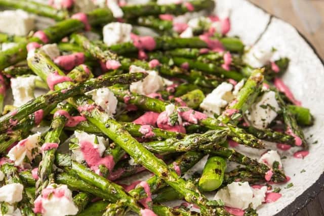 Griddled asparagus with feta and beetroot dressing. Photo courtesy of www.britishasparagus.com