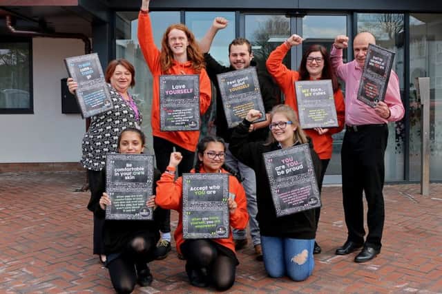 North Lincolnshire Youth Council with the canvas images and staff from North Lincolnshire Council and RDaSH