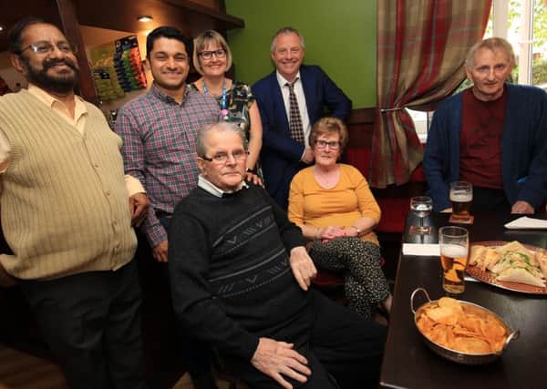 A new dementia friendly pub has opened at Ashley Care Centre in Worksop. Pictured is John Mann MP who opened the new pub with some of the residents and staff.