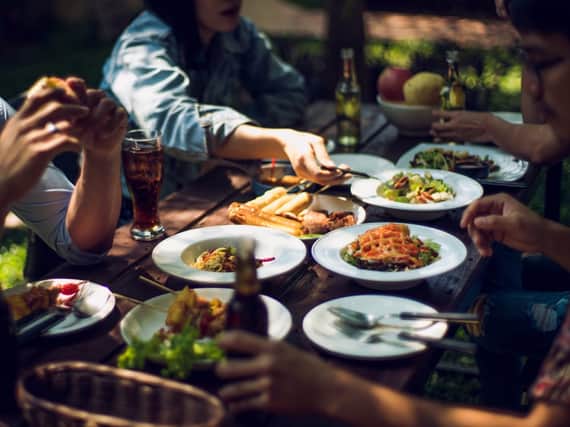 Bills at restaurants and pubs will be cut half when customers eat out, as part of a new government scheme (Photo: Shutterstock)