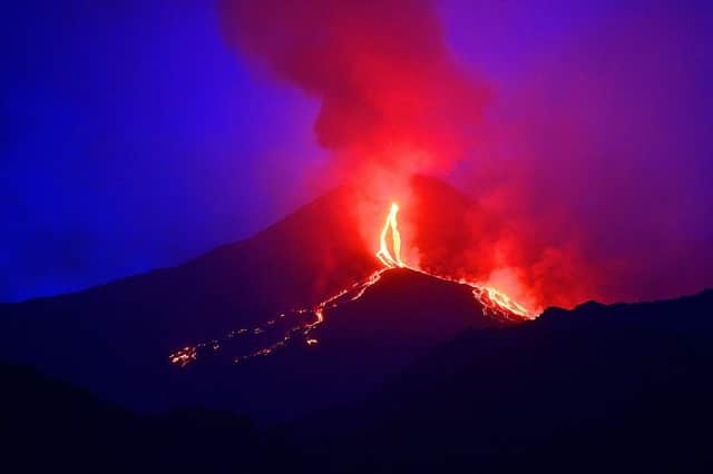 Lava flows from Mount Etna - one of the most active volcanoes in the world in an almost constant state of activity - in August 2014 (Photo: TIZIANA FABI/AFP via Getty Images)