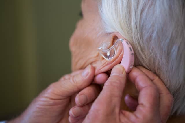 Wearing hearing aids could lower the risk of developing dementia - according to new research (Photo: Shutterstock)