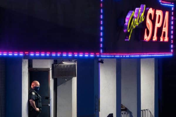 A police officer outside the Gold Spa massage parlour where three people were shot and killed on 16 March 2021 in Atlanta, Georgia (Photo: ELIJAH NOUVELAGE/AFP via Getty Images)