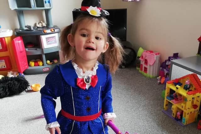 Grace aged 2 is Mary Poppins.