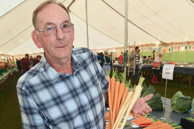 Heckington Show. Don Ridley of Leasingham, winner of longest carrots and longest parsnips.