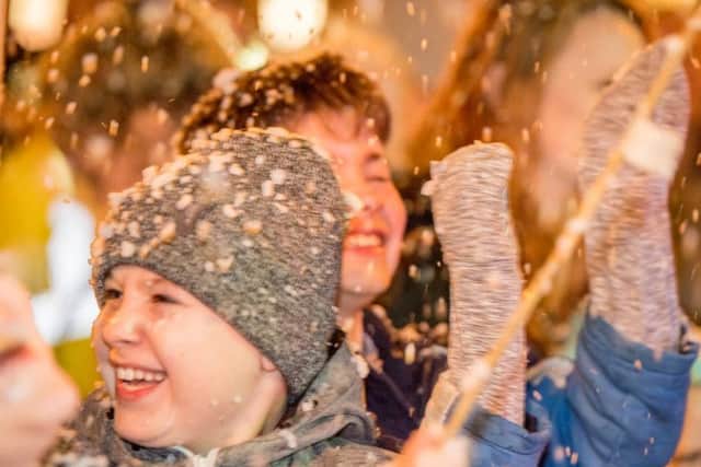 Youngsters enjoy the Christmas in Boston display. Photo: John Aron