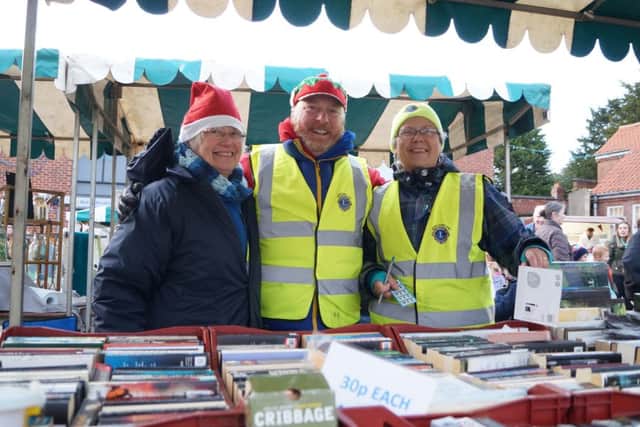 Members of Market Rasen Lions Club on their stall EMN-171127-064723001