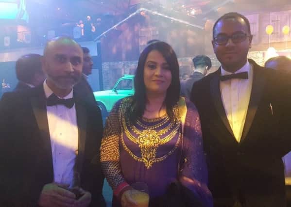 Shortlisted in the top 100 in the UK for the British Curry Awards. Agra restaurant in Sleaford. From left - Head Chef Enus Karim, awards presenter - Poroshmoni Bengali (a singer and TV presenter), and Agra managing director Rakim Karim. EMN-171128-151839001