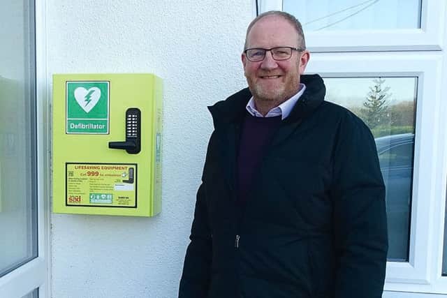 Mark Robertson pictured with the defibrillator unit. EMN-171130-093637001