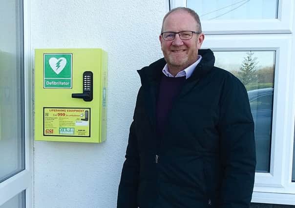 Mark Robertson pictured with the defibrillator unit. EMN-171130-093637001
