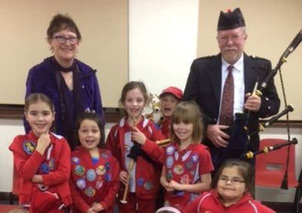 Wragby Rainbows celebrated St. Andrew's Day with Vin and Sue Heron. EMN-170112-122429001