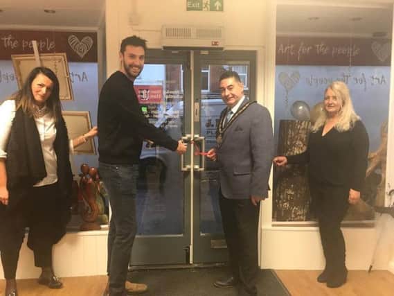 Artist Ed Waite (left) opens Art for the People with Mayor of Skegness, Coun Danny Brookes, manageress  Kasia Chotenovska, of Poland,Â  and Maggie Rhodes. ANL-170112-155313001
