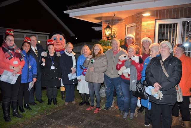 Residents of Philip Grove in Skegness have been able to celebrate Christmas and remember loved ones at a special event for the community. Photo: Barry Robinson. ANL-170412-125557001