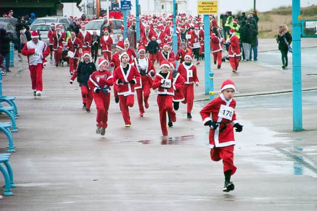 Santa Fun Run winner George Wilson, nine, of Skegness, out in front.