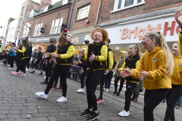 Youngsters get involved in the flash mob.