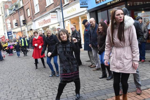 People get involved with the flash mob.