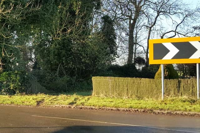 The bend on the A1028 between Gunby and Ulceby where a car is said to have ploughed through the fence into a garden. ANL-170712-165127001