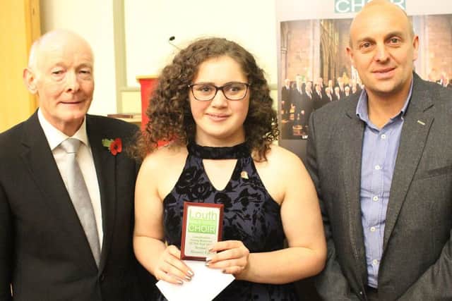 Chairman of Louth Male Voice Choir Tim Elliott, Felicity, and Coun Adam Grist. EMN-170712-143520001