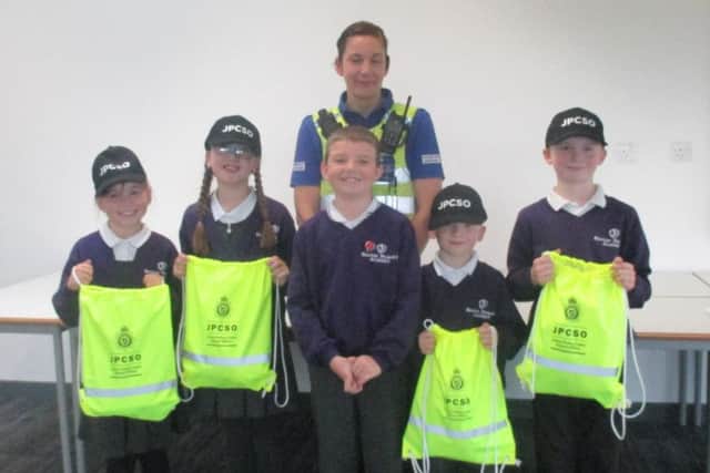 Year 4 pupils at Beacon Primary Academy have been appointed Junior Police Community School Officers. ANL-170712-153714001
