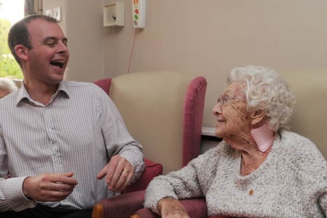 MP Matt Warman with resident Rose during his visit to Park Place, Boston.