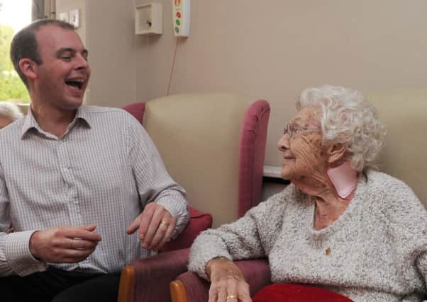 MP Matt Warman with resident Rose during his visit to Park Place, Boston.